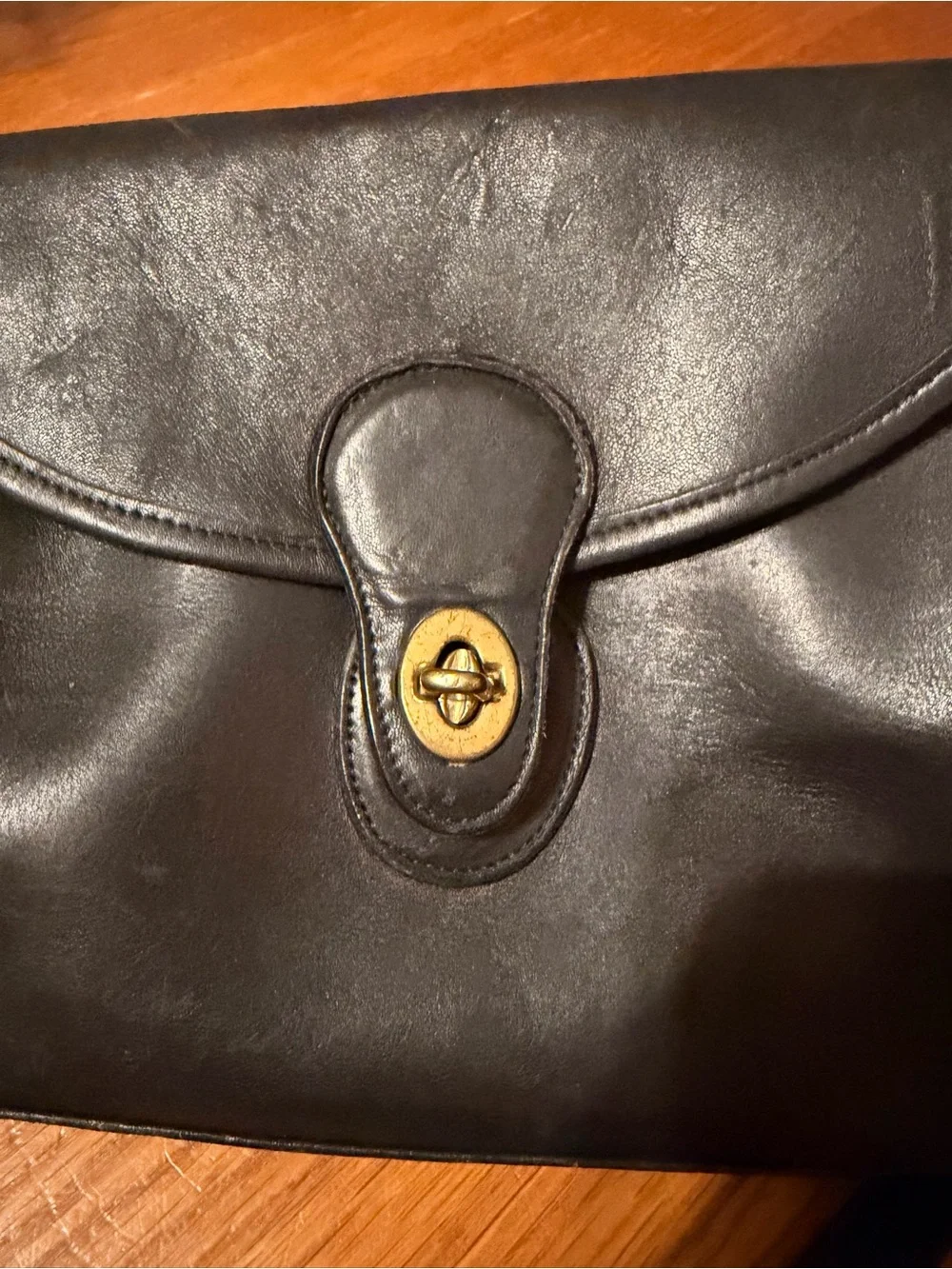 Vintage Early 1980’s Coach Black Leather Crossbody with Brass Turnlock Accent